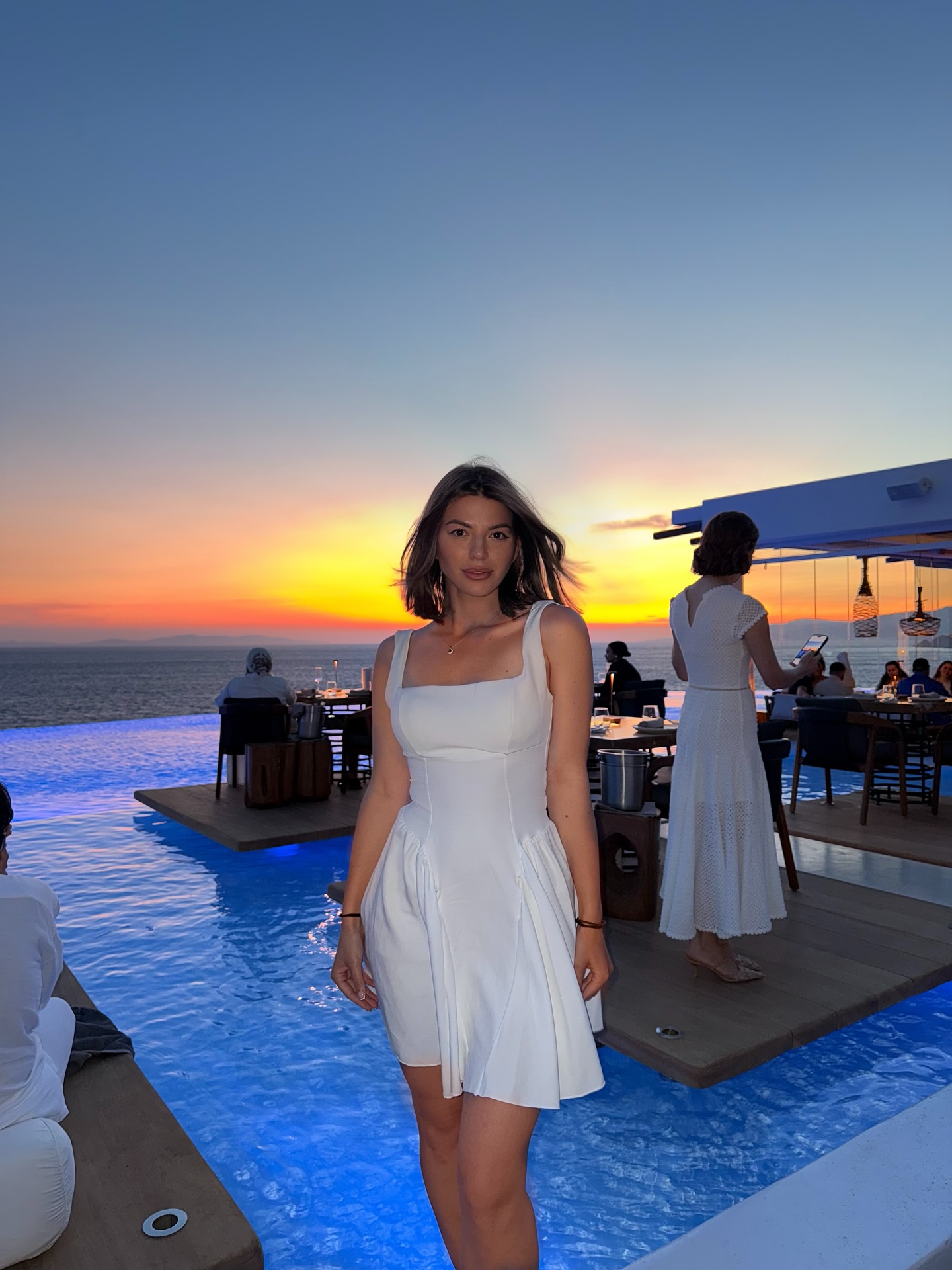 Anna Lash, evening, poolside.